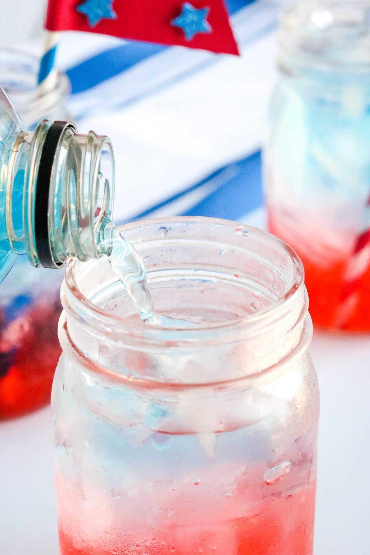 Looking for a kid-friendly fourth of July drink? Meet the 4th of July Layered Sparkling drink!! Plus check out the 4th of July Craft Straws to make as well!