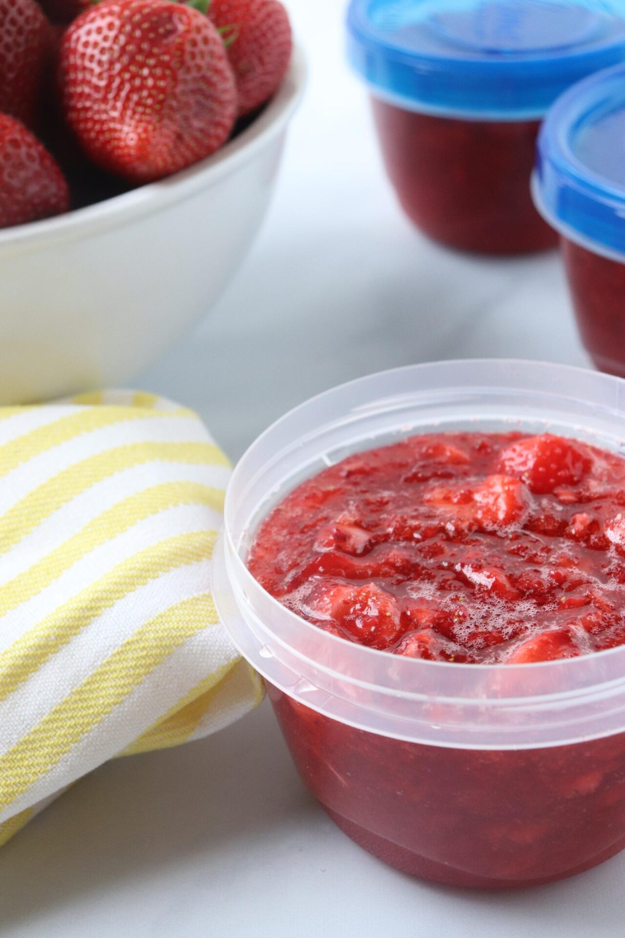 strawberry freezer jam with yellow napkin