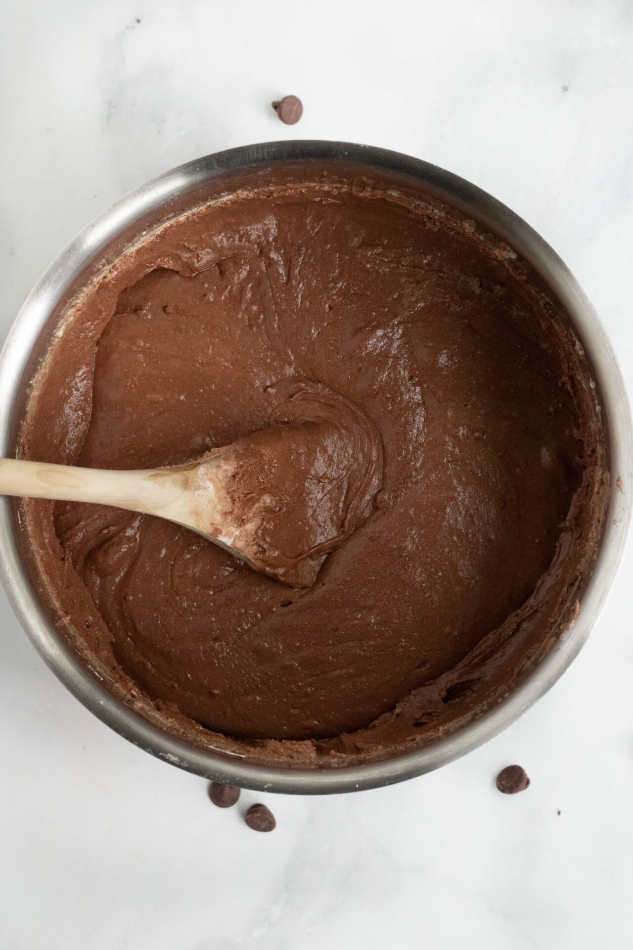 fudge in pot with wooden spoon