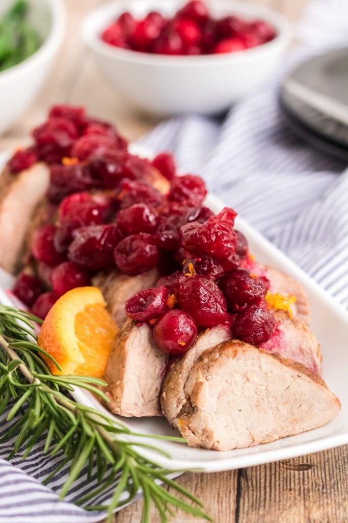Slow cooker Cranberry Pork Tenderloin is easy to make. The pork tenderloin combined with cranberry and orange offers so much flavor! This will be the star of your holiday dinner table or any time you decide to make it!