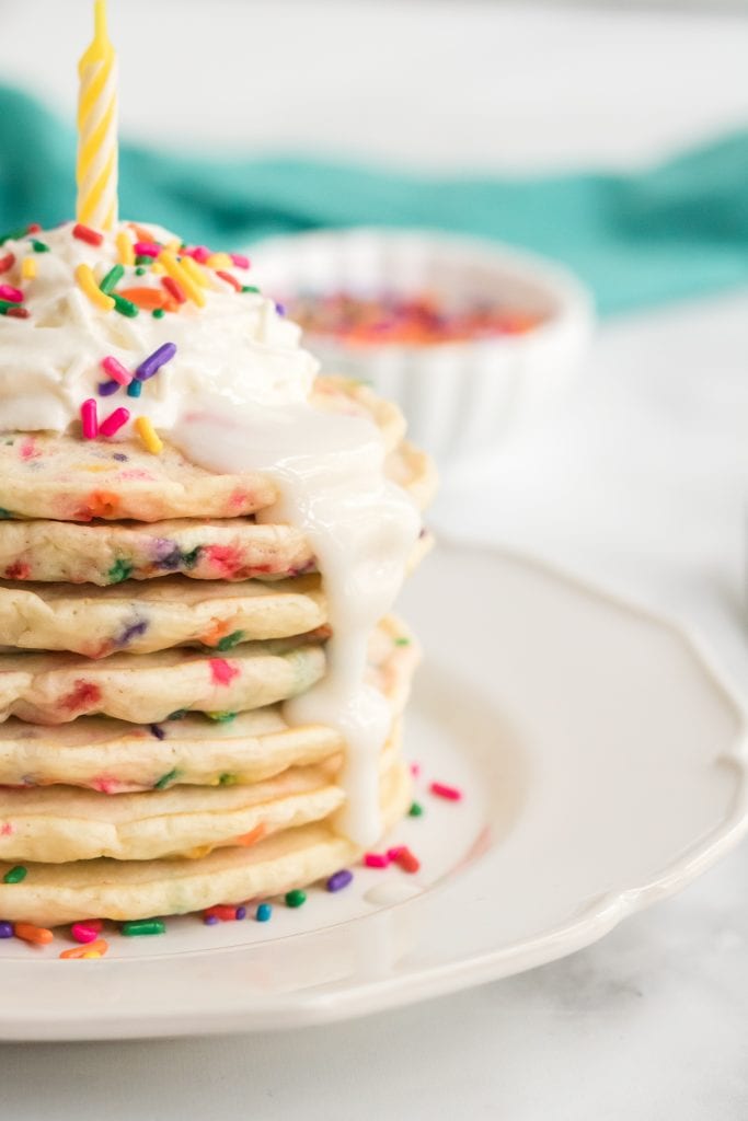 These are the best funfetti pancakes from scratch. These fluffy sprinkle pancakes will make everyone feel special every time they take a bite of them!