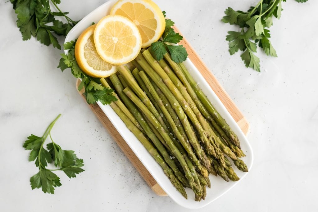 Instant pot asparagus with lemon pieces