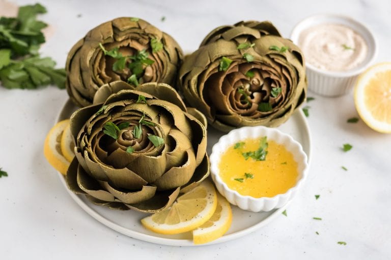 Melted Lemon Garlic Butter is the most versatile and delicious sauce you will ever make. Get ready to let your artichokes and other foods swim in this dipping sauce for artichokes!