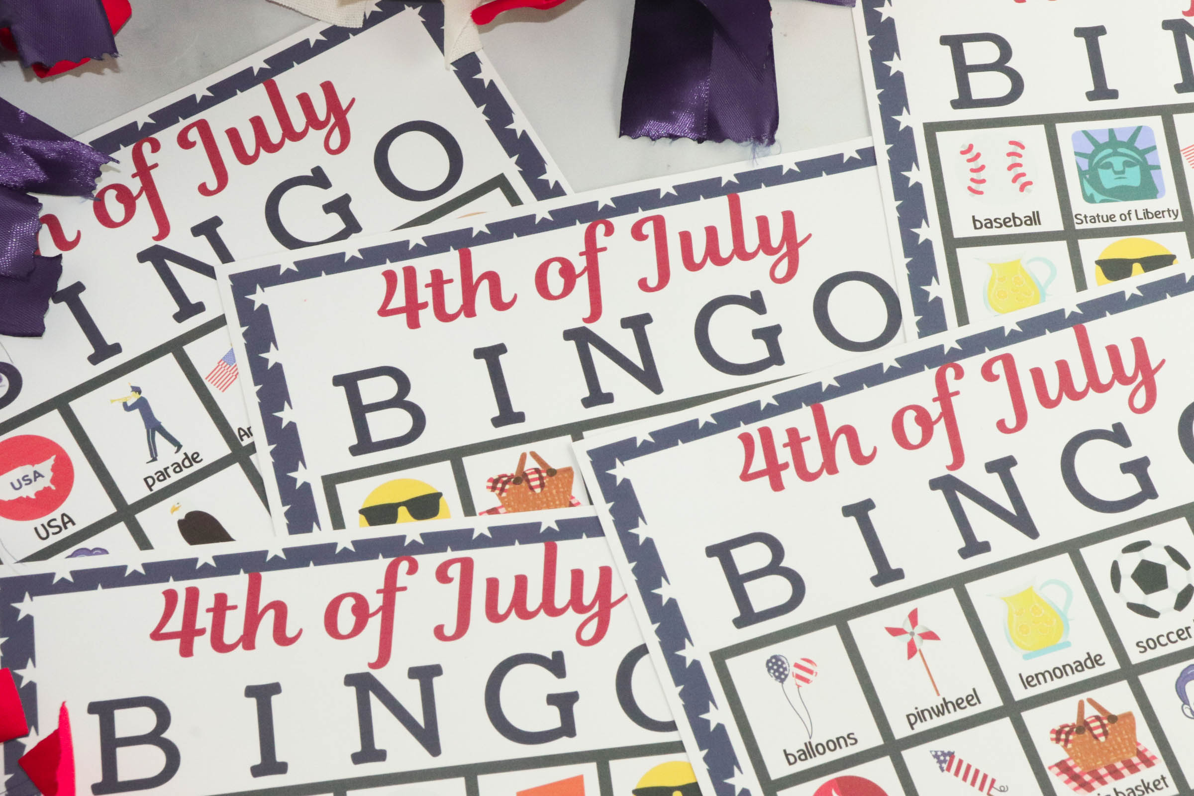 Close up of 5 4th of July Bingo sheets
