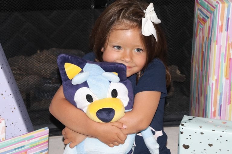 Talie loving on bluey