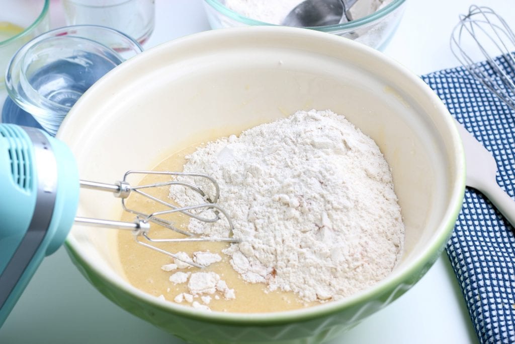 donut batter in a bowl with dry ingredients
