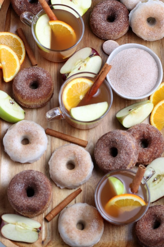 variety of donuts on cutting board