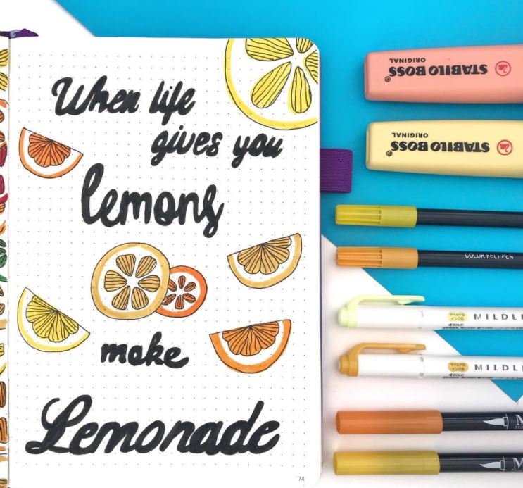 When life gives you lemons quote with markers and pens