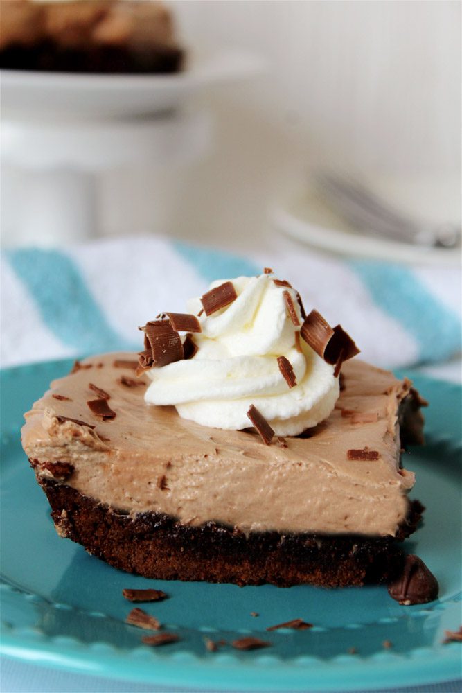 brownie french silk pie recipe topped with chocolate and whipped cream