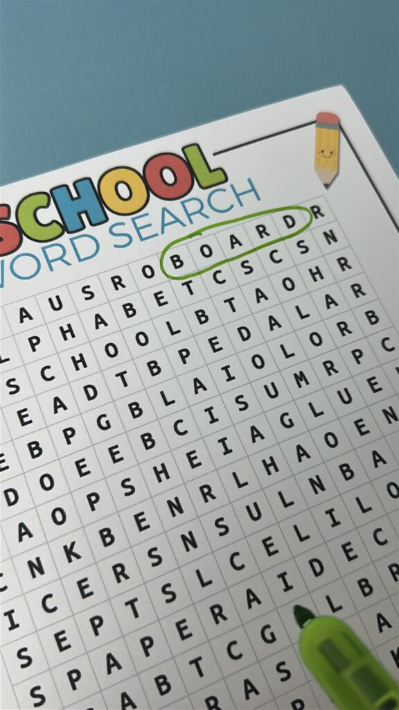 A school word search with “board” circled in green marker.