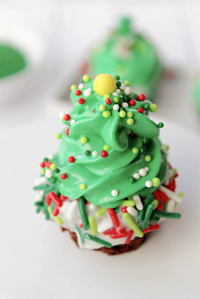 christmas tree brownie bites on a white counter