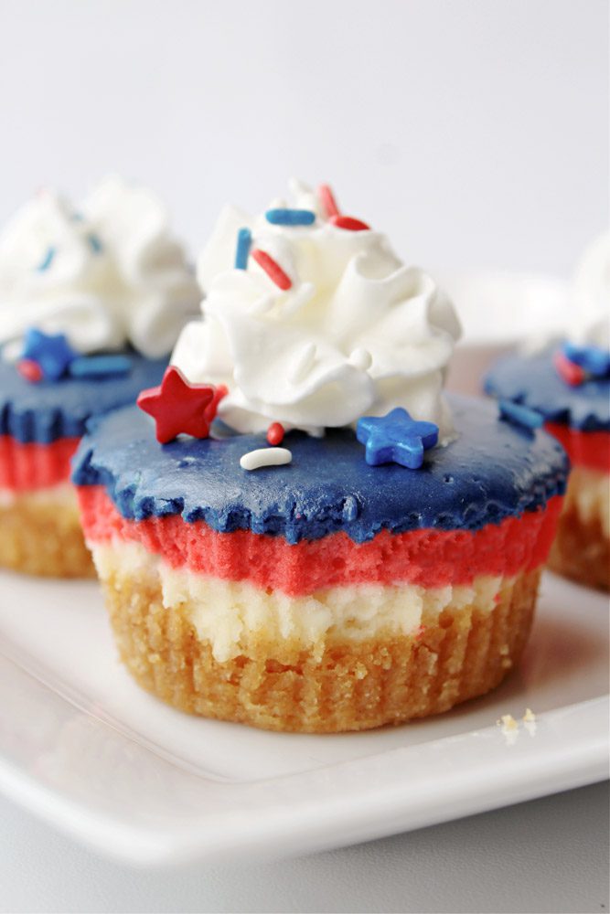 Close up of Patriotic Mini Cheesecakes with whipped cream