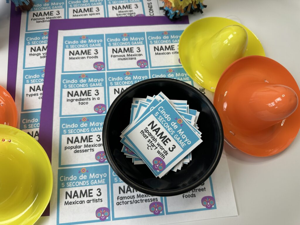 cinco de mayo 5 second game cards in bowl with more cinco de mayo 5 second game cards behind it. 