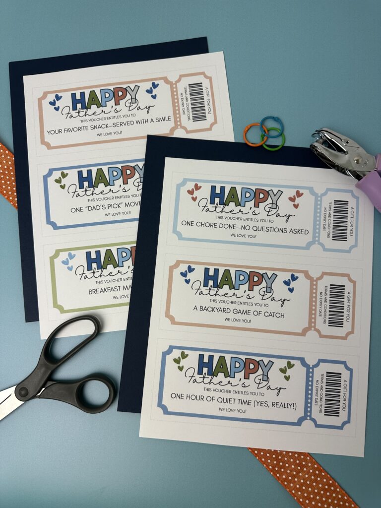 closeup up of Father's Day coupons PDF on blue background