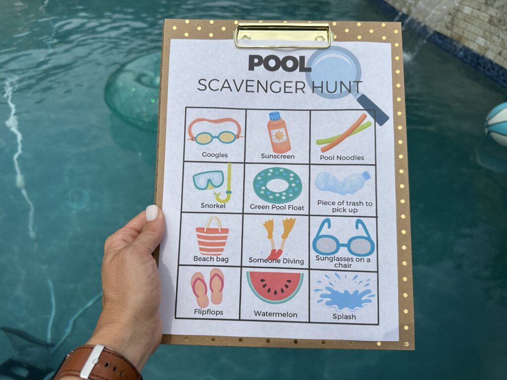 pool scavenger hunt on clipboard with pool in background. 