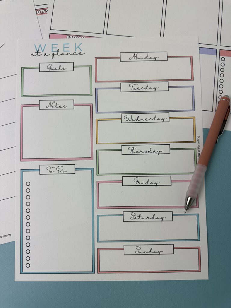 Four colorful printable weekly planner sheets displayed on a blue surface, each featuring sections for days of the week, goals, notes, and to-do lists.