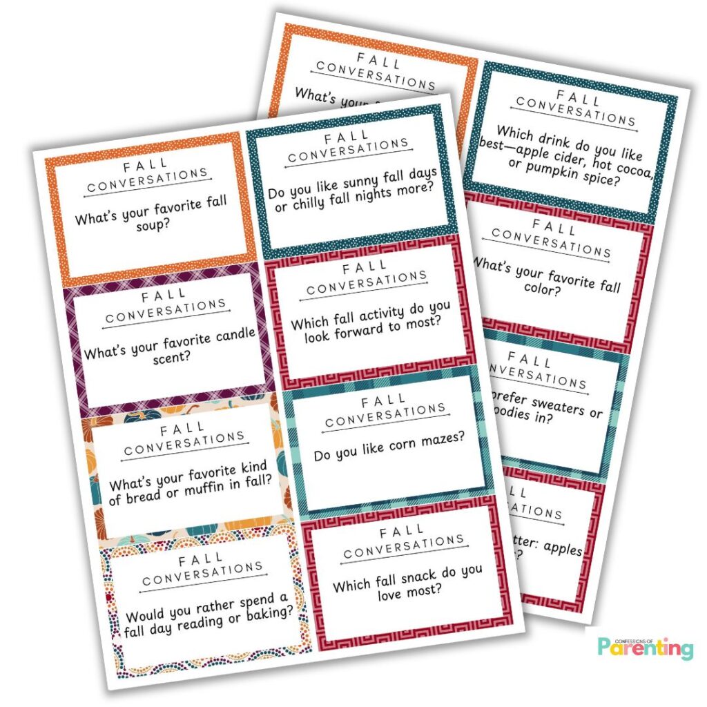 Assorted printable fall conversation starter cards spread out, asking cozy seasonal questions such as 'What’s your favorite fall soup?' and 'Do you like corn mazes?