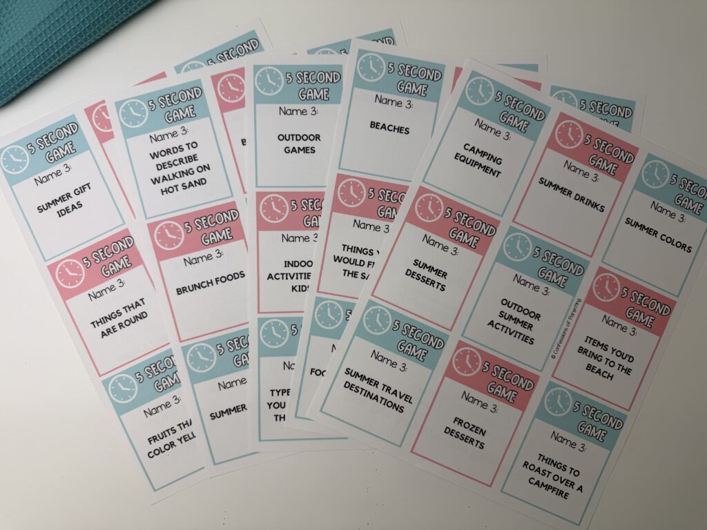 Summer 5 second game printable cards spread out with prompts like summer drinks, beach items, and outdoor activities for kids