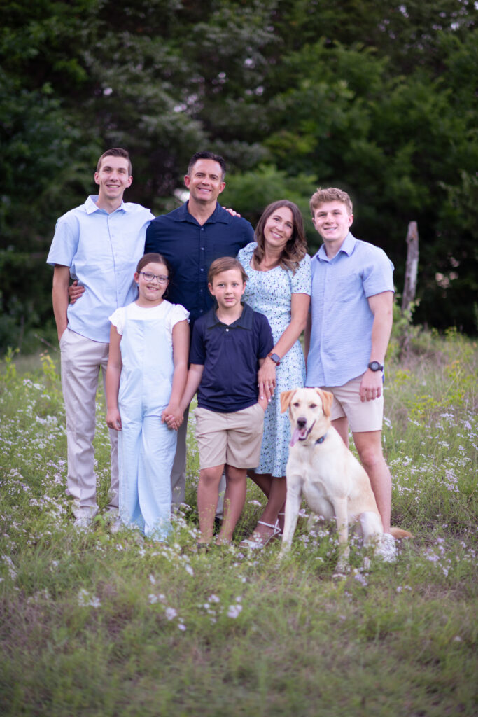 Michele Tripple, founder of Confessions of Parenting Family with dog
