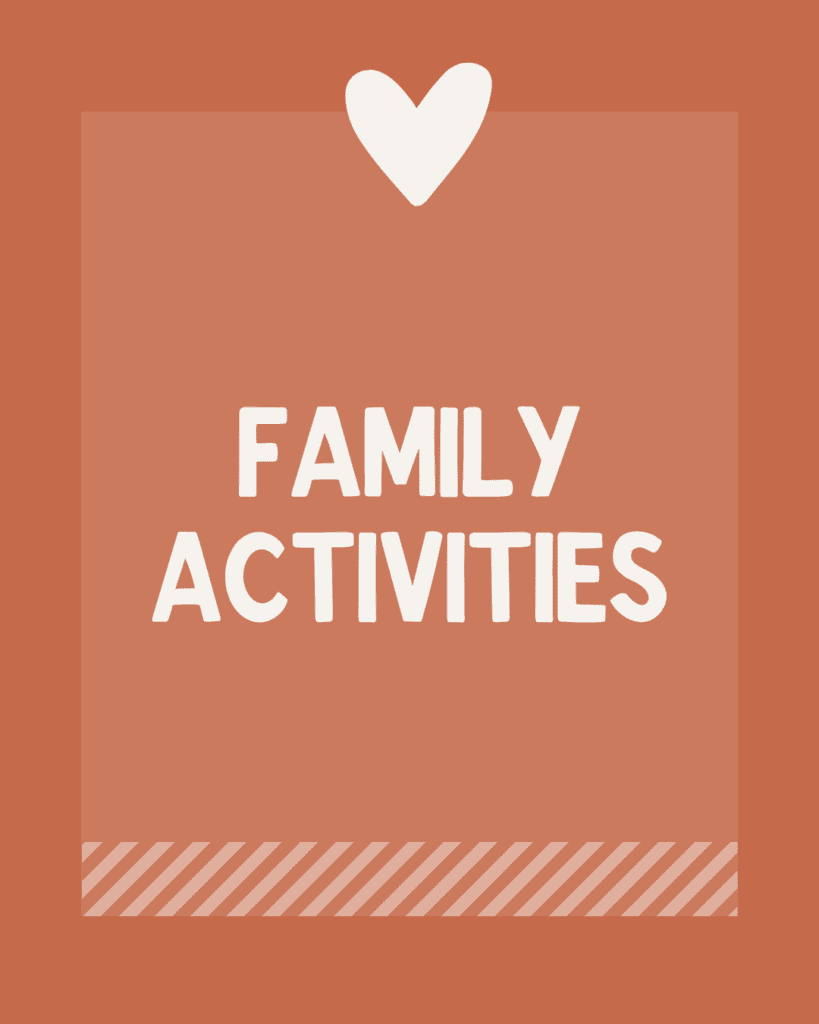 rust background with white words "family activities" with white heart at the top